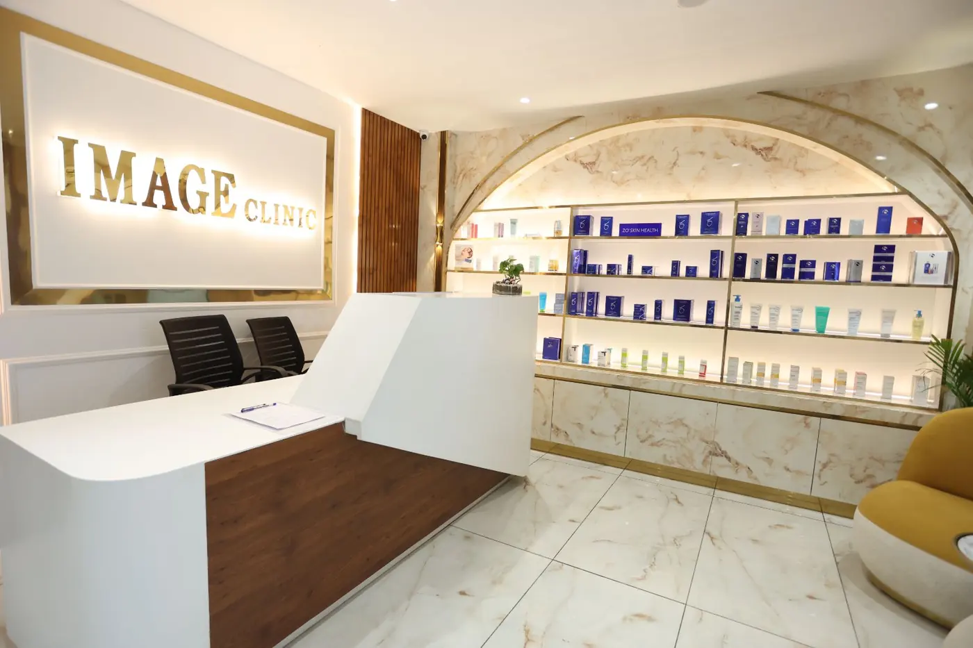 Dermatologist performing a skin treatment at Image Clinic, Gurugram